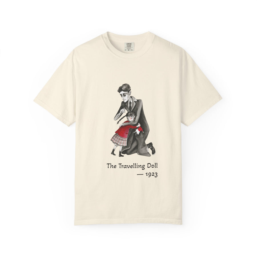 Kafka and the Travelling Doll literary T-shirt with a vintage storyteller illustration on a garment-dyed unisex T-shirt, product view