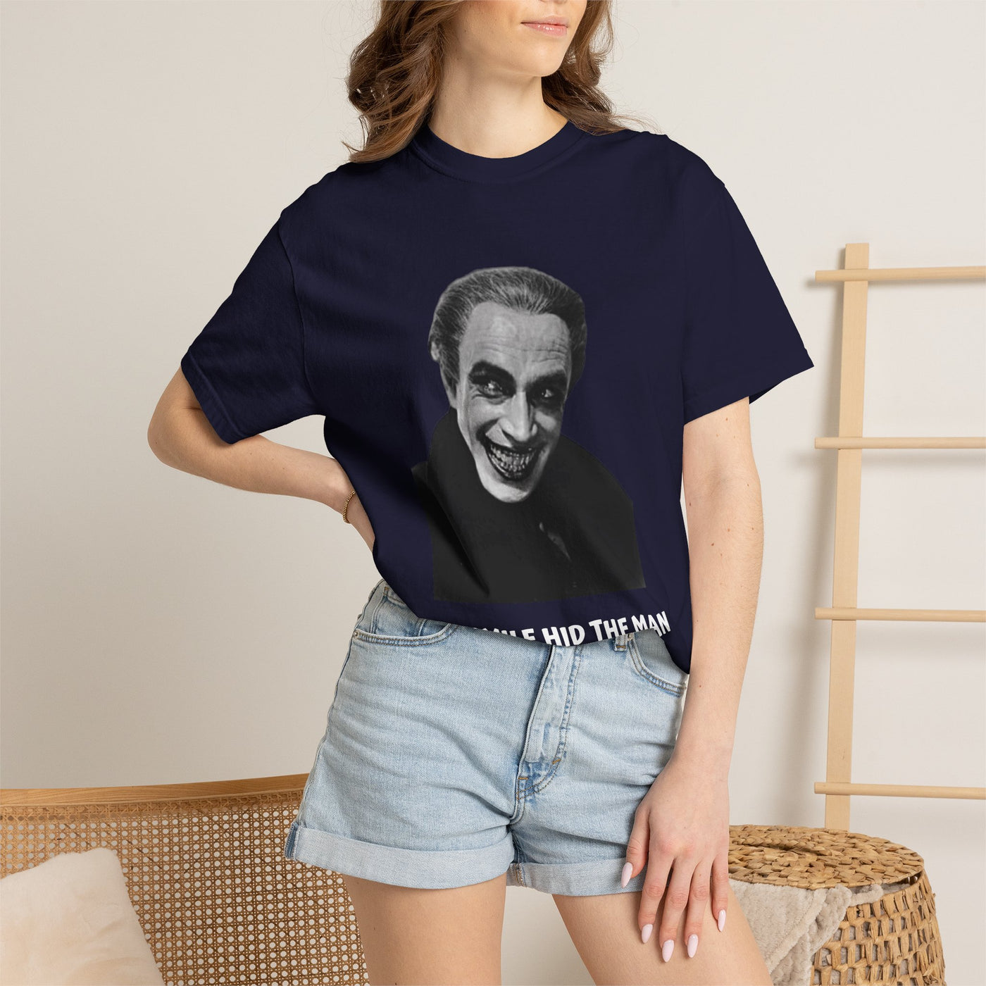 The Man Who Laughs literary T-shirt with Gwynplaine portrait and “The Smile Hid the Man” on a garment-dyed unisex T-shirt, product view