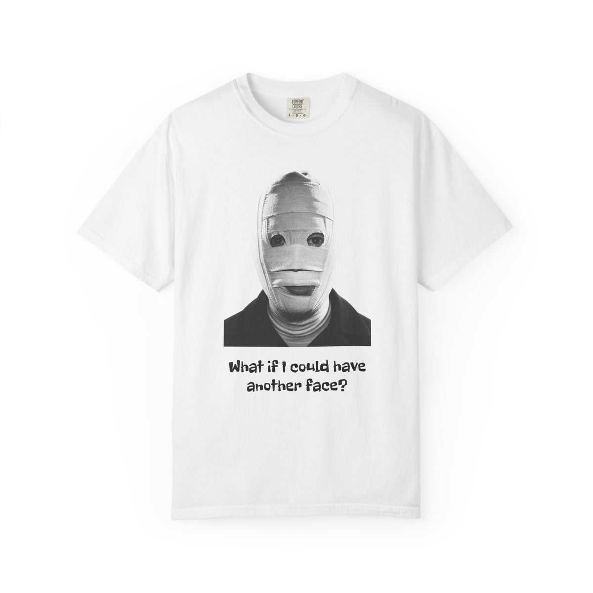 The Face of Another literary T-shirt with a bandaged mask and existential question on a garment-dyed unisex T-shirt, product view