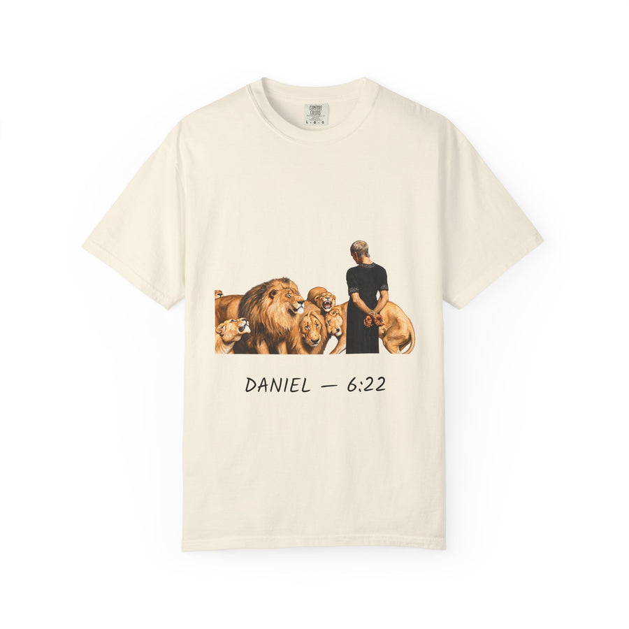 Daniel 6:22 Christian T-shirt showing Daniel standing peacefully among lions on a garment-dyed unisex T-shirt, product view
