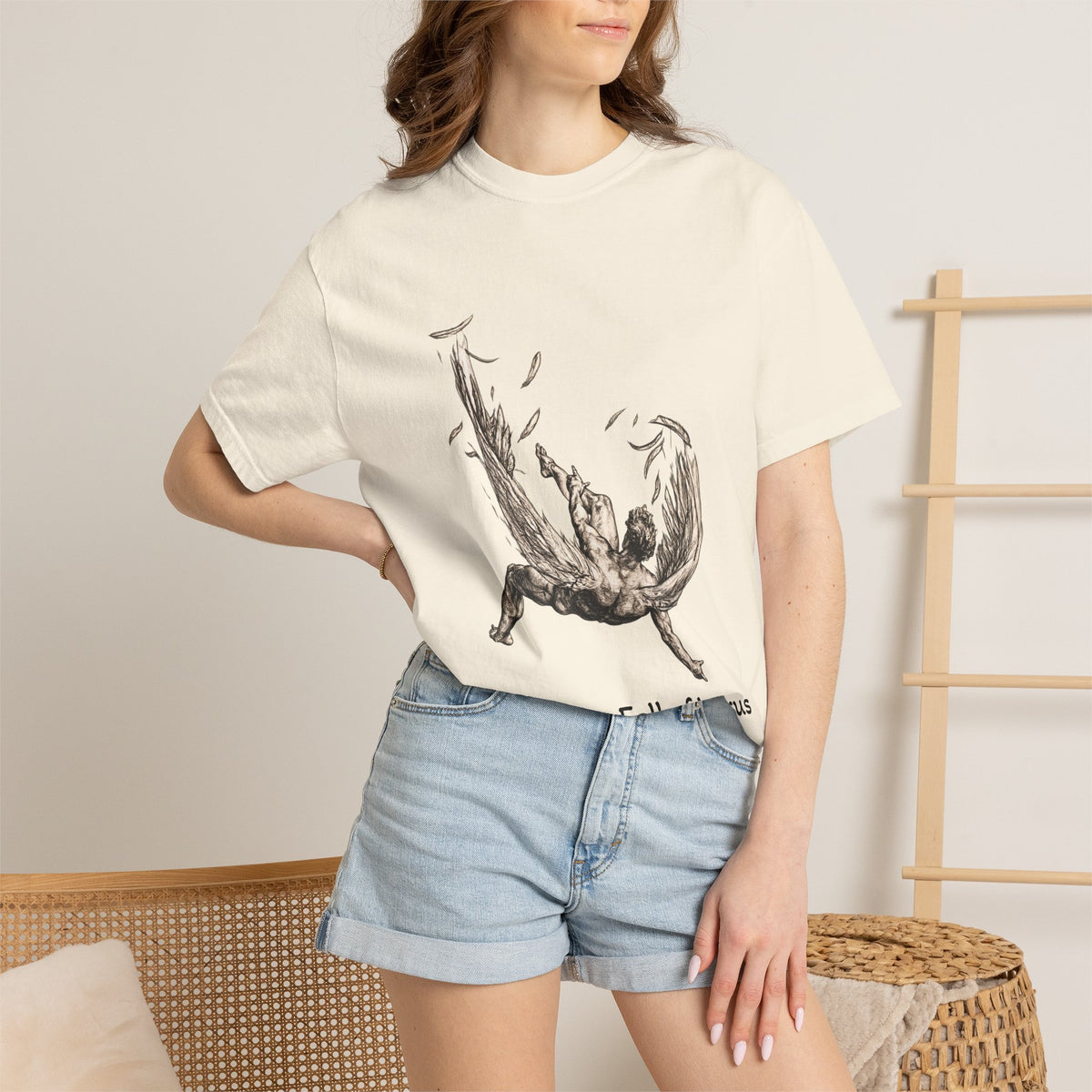 Fall of Icarus Greek mythology T-shirt with a falling winged figure on a garment-dyed unisex T-shirt, product view