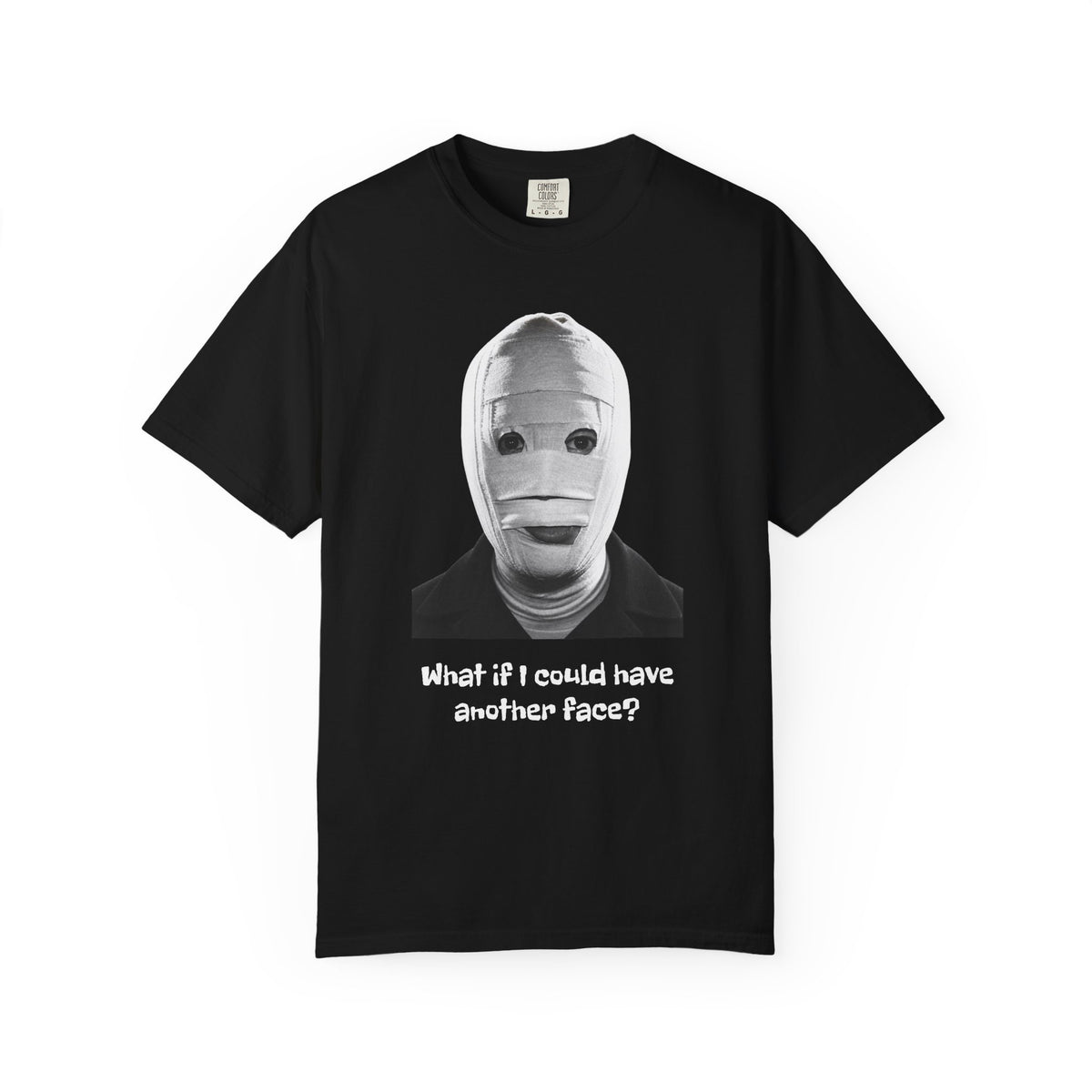 The Face of Another literary T-shirt with a bandaged mask and existential question on a garment-dyed unisex T-shirt, product view
