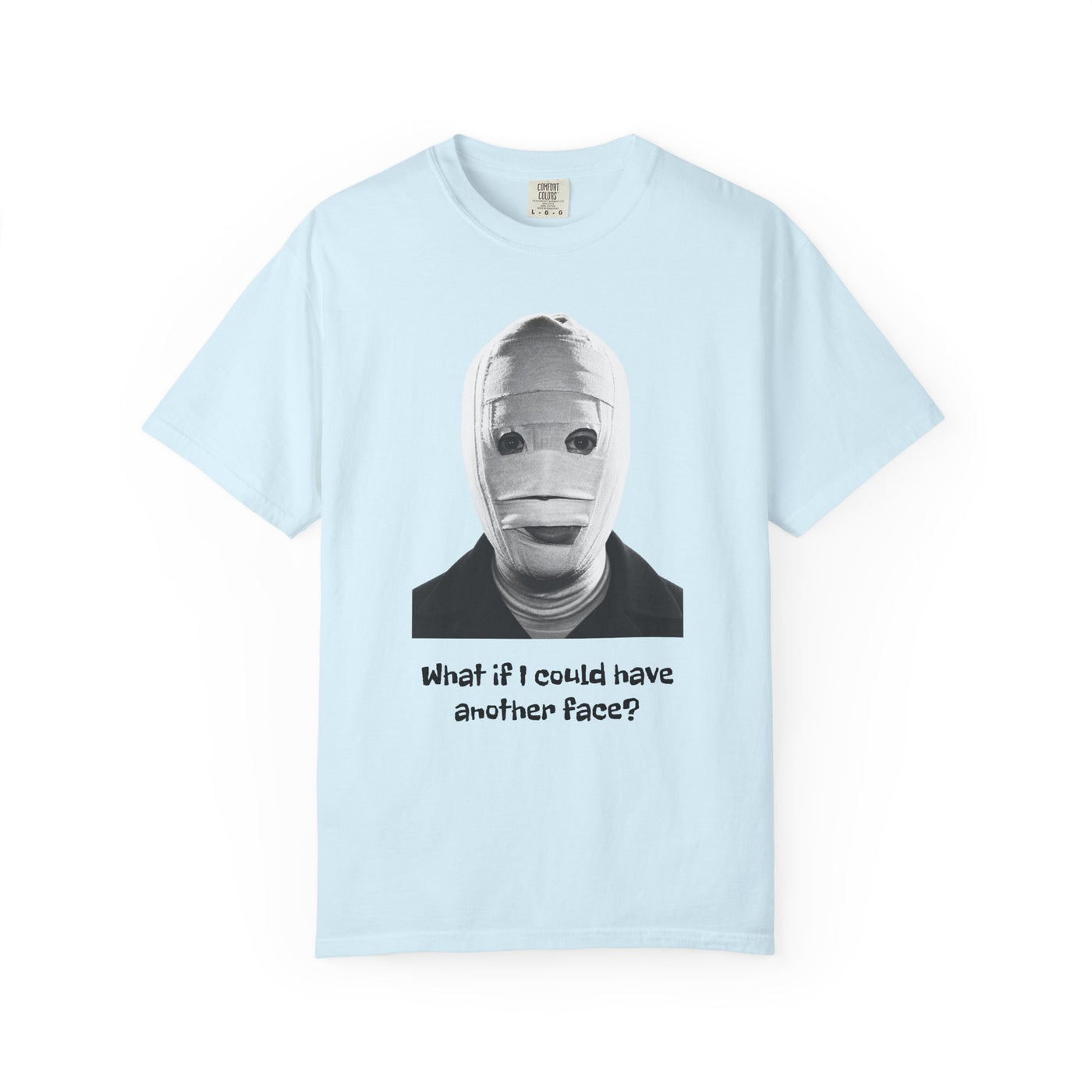 The Face of Another literary T-shirt with a bandaged mask and existential question on a garment-dyed unisex T-shirt, product view