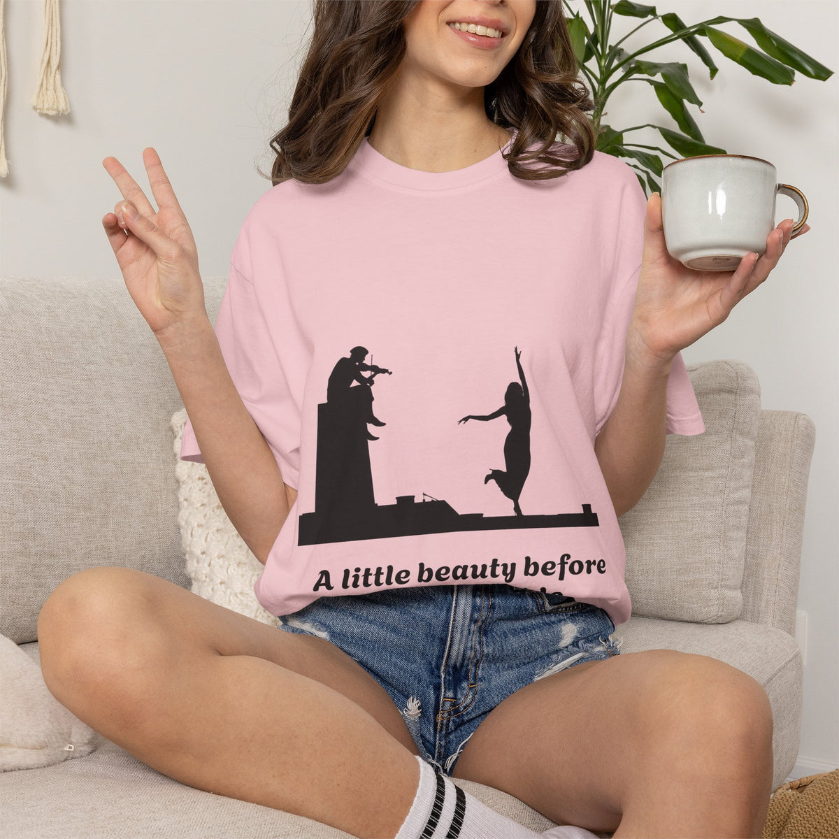 Vintage violin graphic T-shirt showing a violinist, dancing figure and “A Little Beauty Before the Inevitable” on a garment-dyed unisex T-shirt, product view