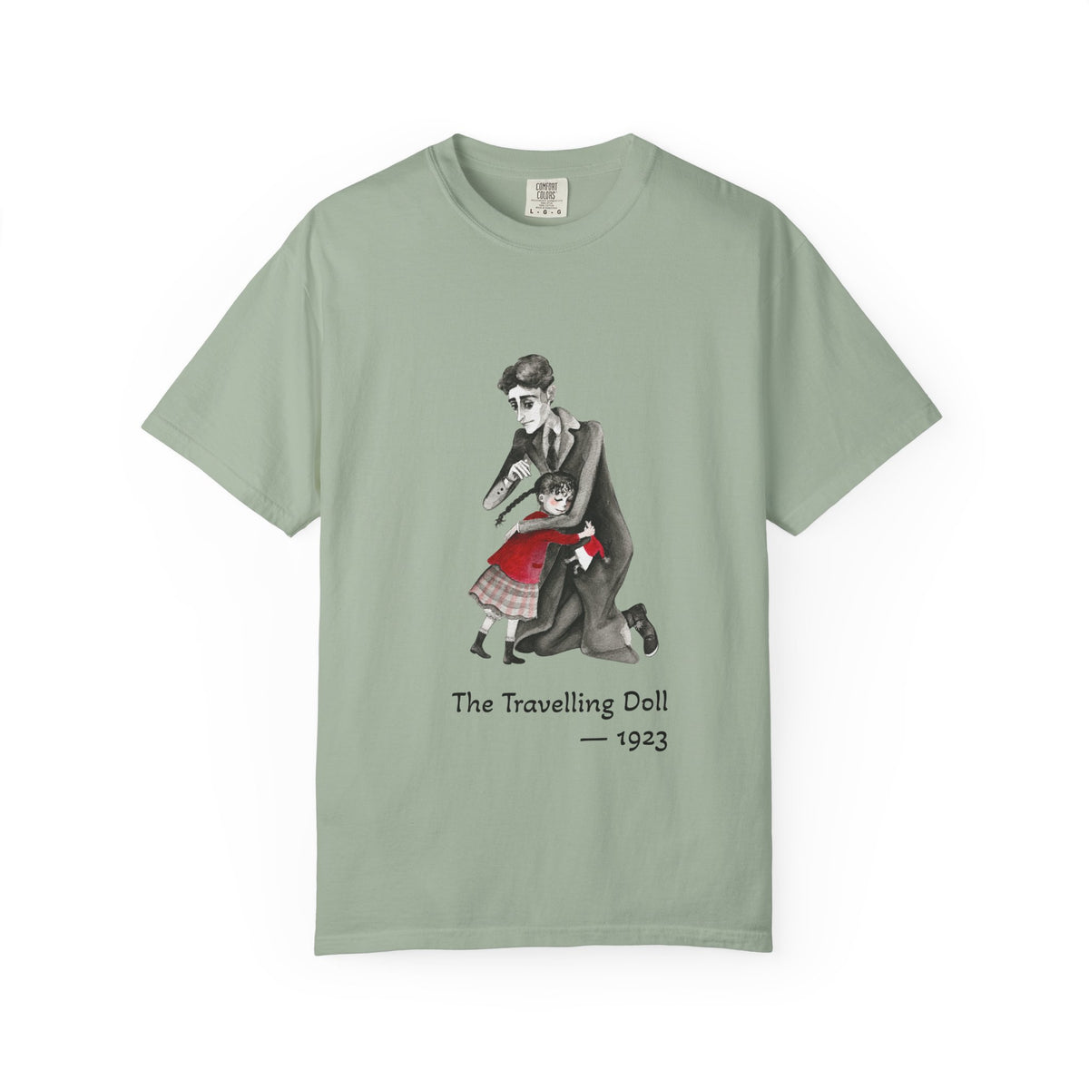 Kafka and the Travelling Doll literary T-shirt with a vintage storyteller illustration on a garment-dyed unisex T-shirt, product view