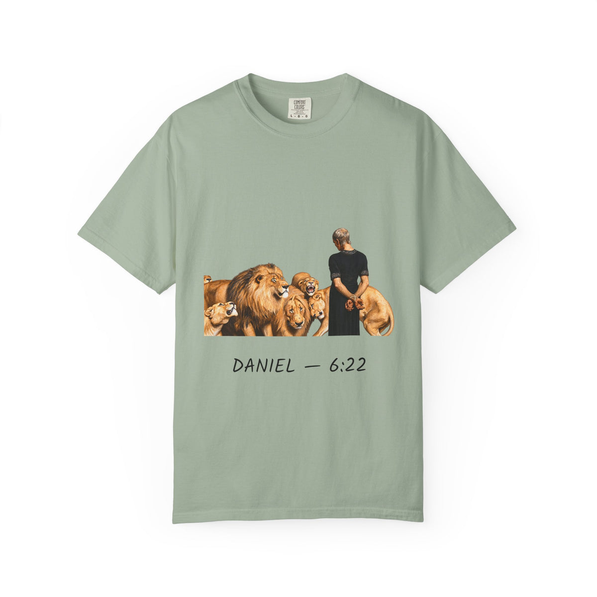 Daniel 6:22 Christian T-shirt showing Daniel standing peacefully among lions on a garment-dyed unisex T-shirt, product view
