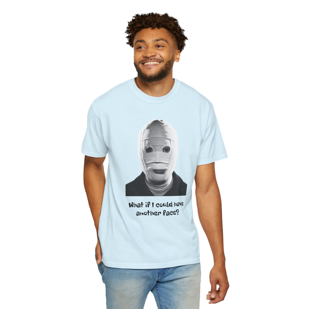 The Face of Another literary T-shirt with a bandaged mask and existential question on a garment-dyed unisex T-shirt, product view