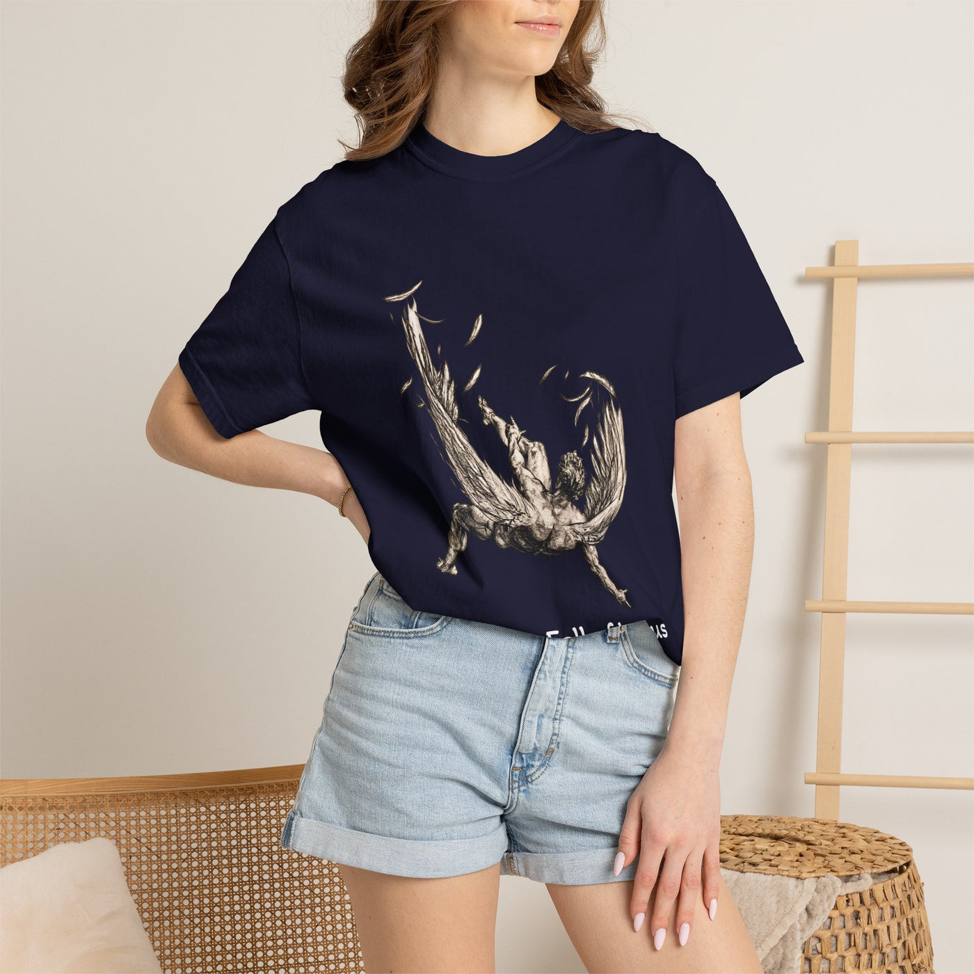 Fall of Icarus Greek mythology T-shirt with a falling winged figure on a garment-dyed unisex T-shirt, product view