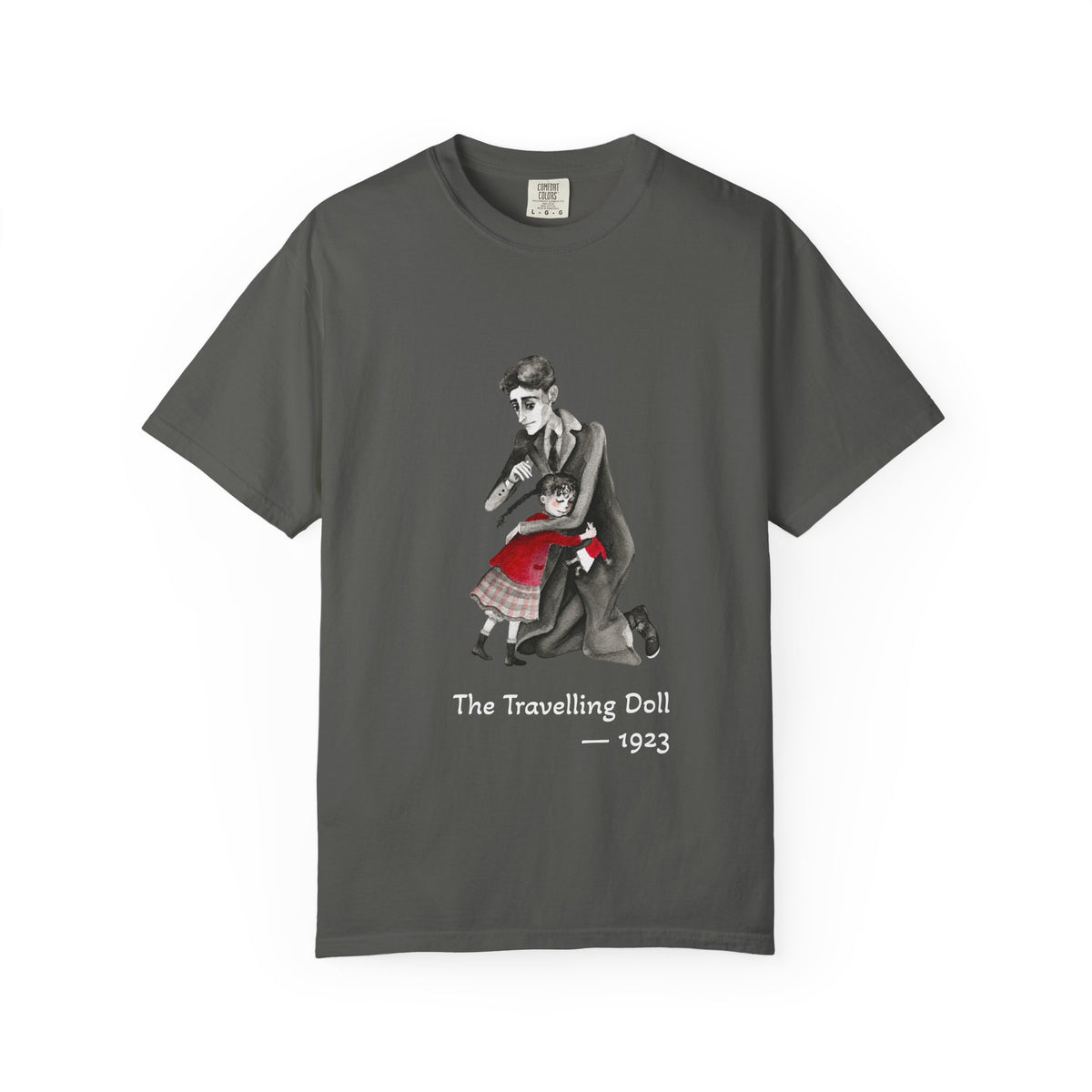 Kafka and the Travelling Doll literary T-shirt with a vintage storyteller illustration on a garment-dyed unisex T-shirt, product view