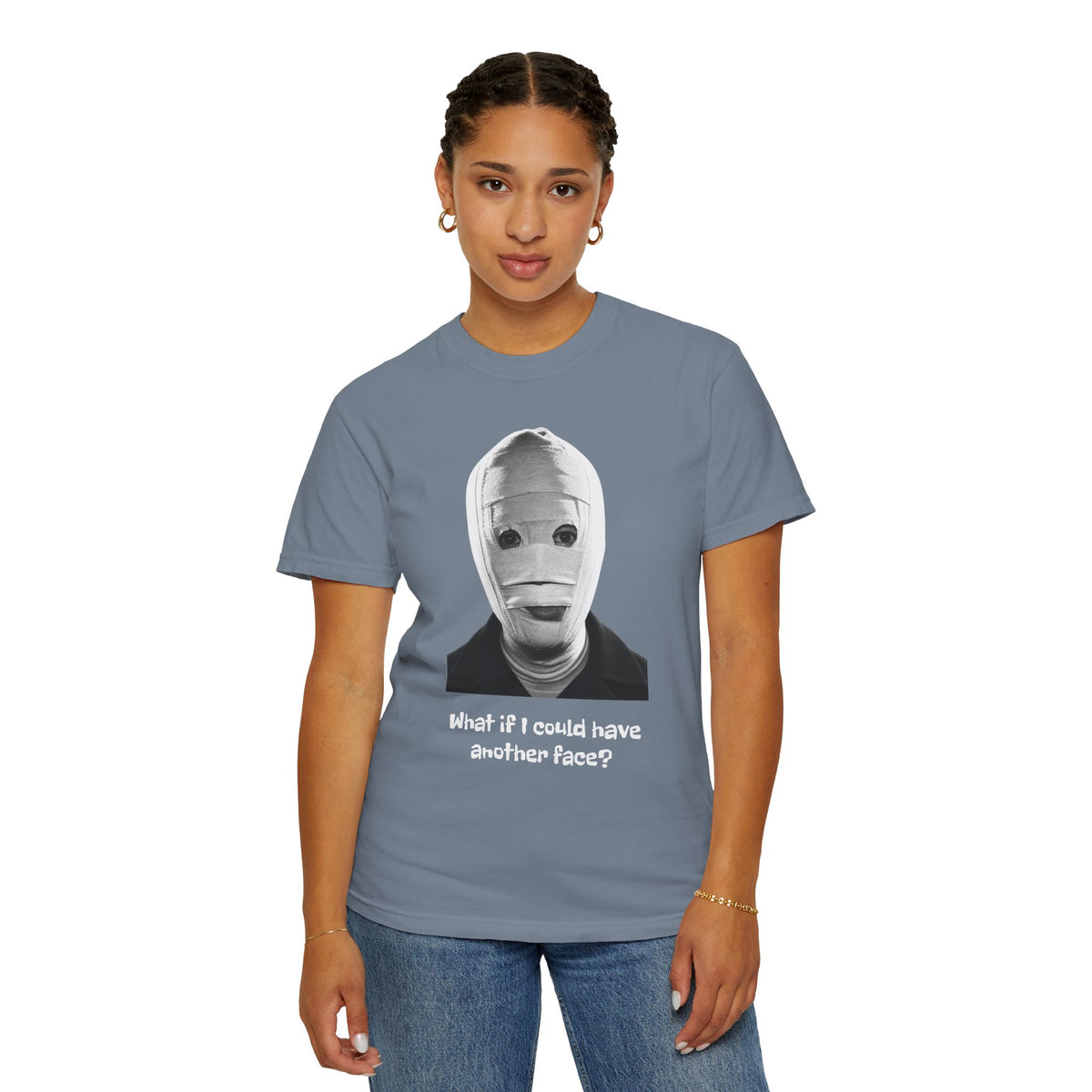The Face of Another literary T-shirt with a bandaged mask and existential question on a garment-dyed unisex T-shirt, product view
