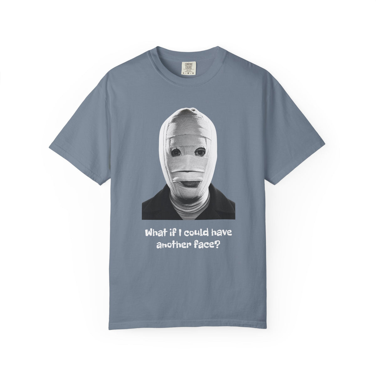 The Face of Another literary T-shirt with a bandaged mask and existential question on a garment-dyed unisex T-shirt, product view