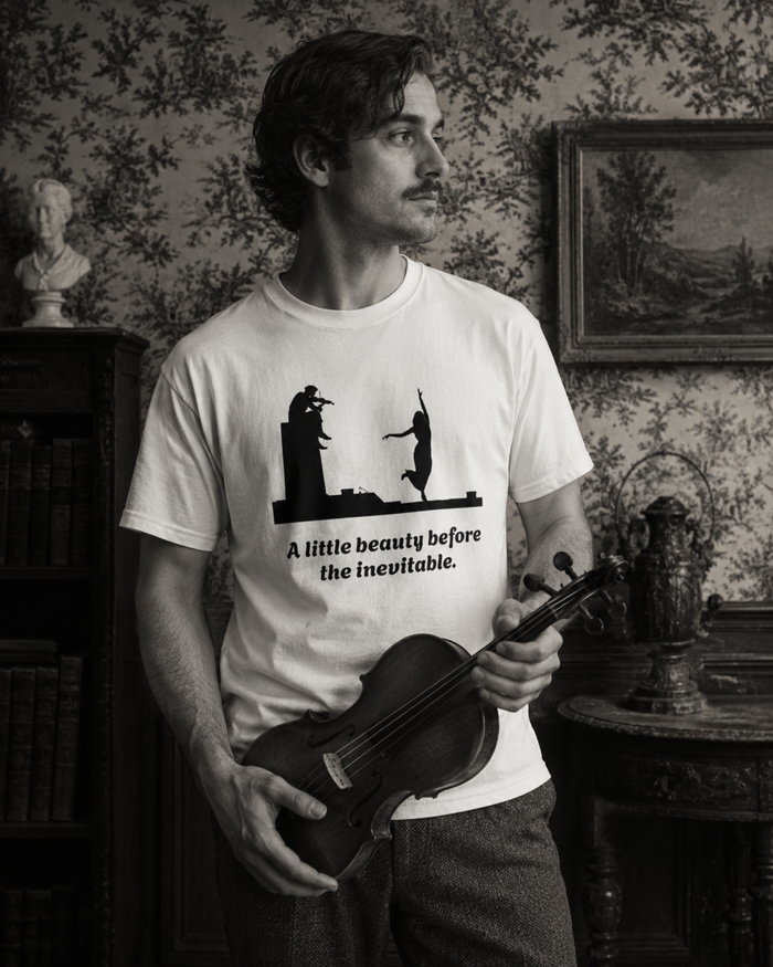 Vintage violin graphic T-shirt showing a violinist, dancing figure and “A Little Beauty Before the Inevitable”