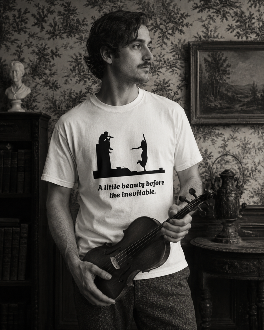 Vintage violin graphic T-shirt showing a violinist, dancing figure and “A Little Beauty Before the Inevitable”